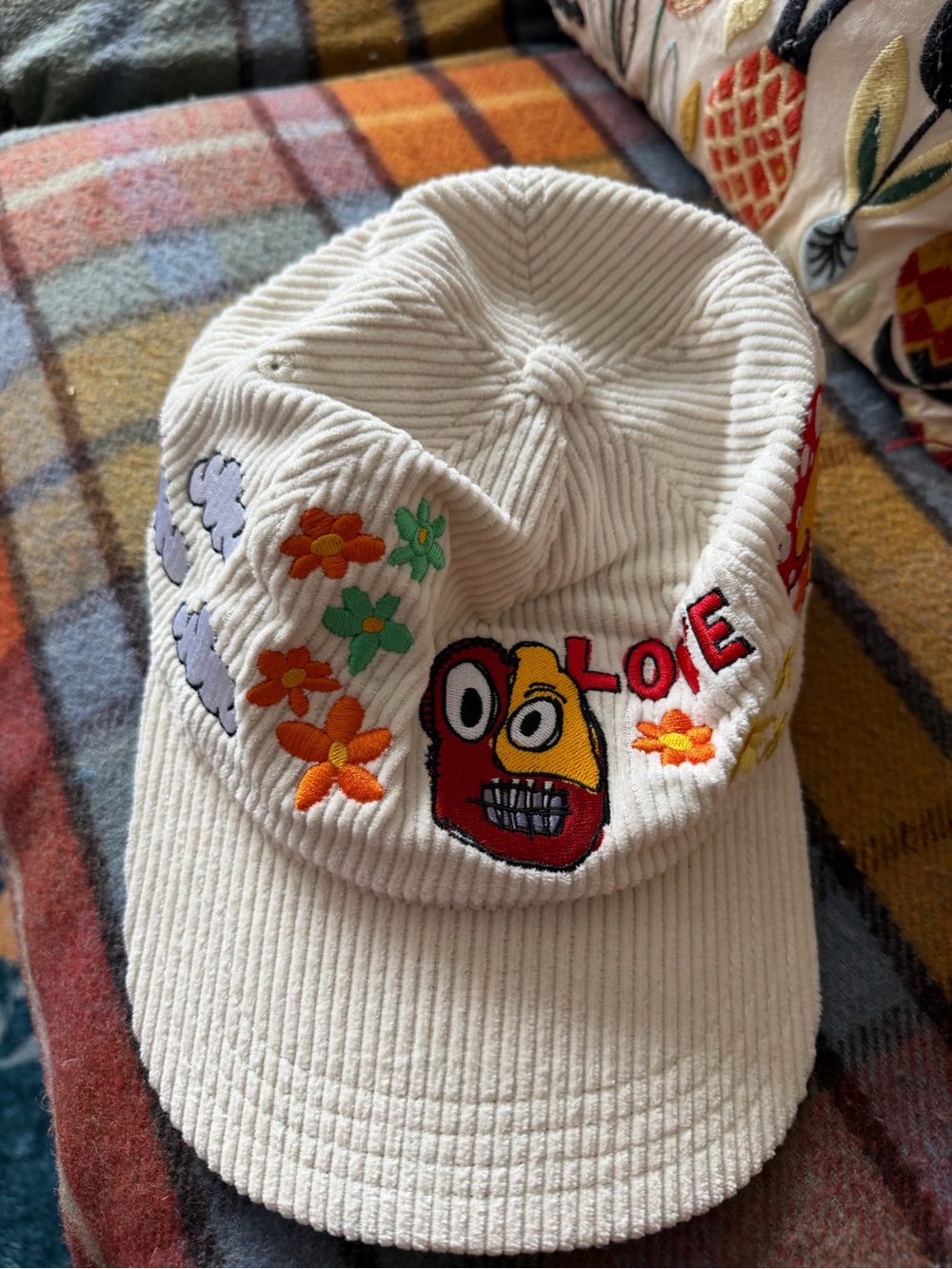 Urban Outfitters Cream Corduroy Cap with Colorful Embroidered Flowers & Faces